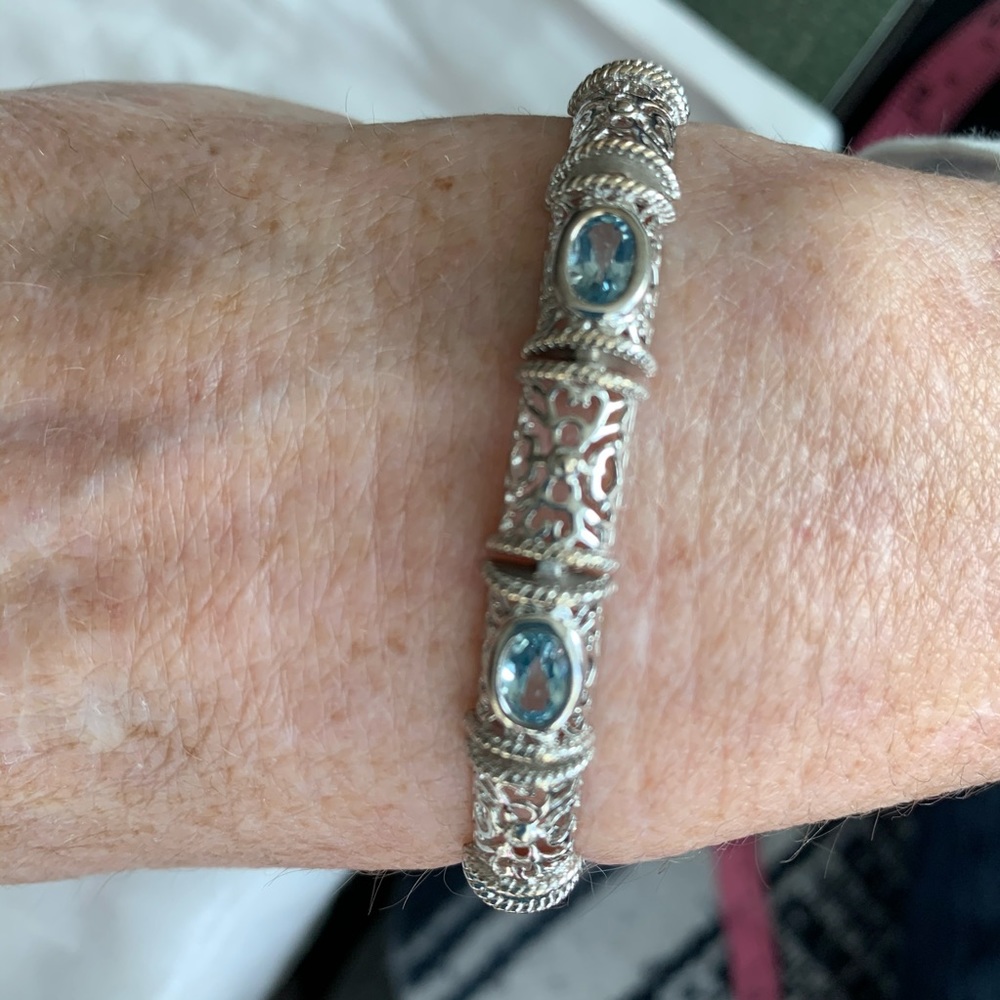 Sterling silver blue topaz filigree bracelet.